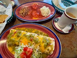 Duran's Station signature dishes Red Chile Plate with a Rolled Tortilla
Green Chile Chicken Enchiladas
Cheese Enchiladas